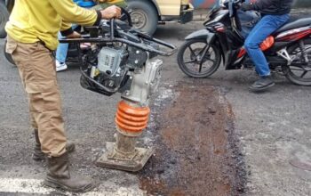 Pemkot Tangerang Tuntaskan Perbaikan Jalan Pintu Air 10 di Tengah Musim Hujan