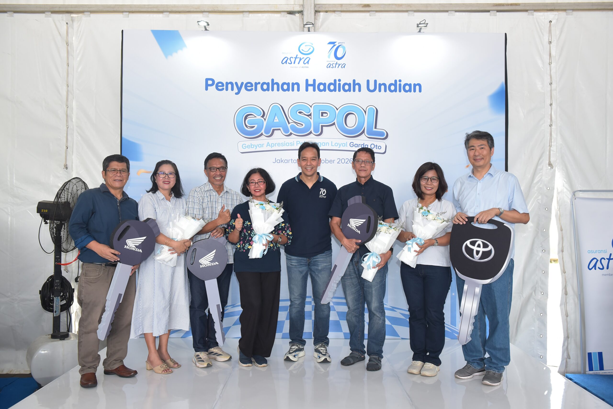 Dommy Eriko Sabet Toyota Veloz Hybrid dari Program Undian GASPOL Asuransi Astra